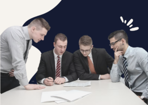 Team reviewing documents together at a meeting table