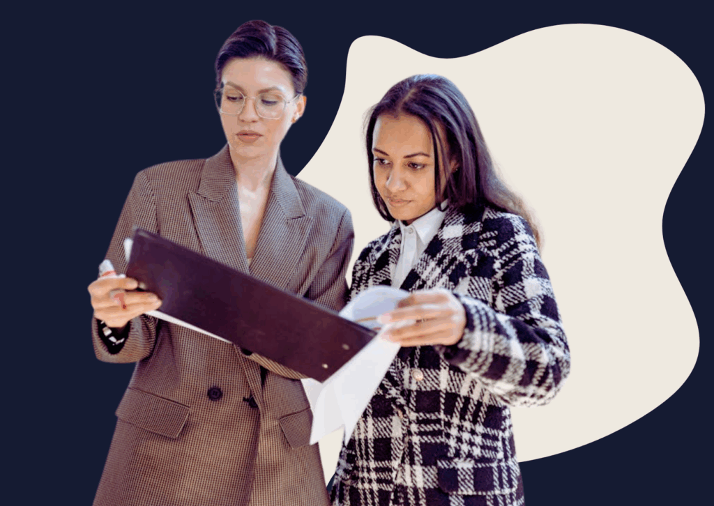 Broker and client reviewing a loan application document