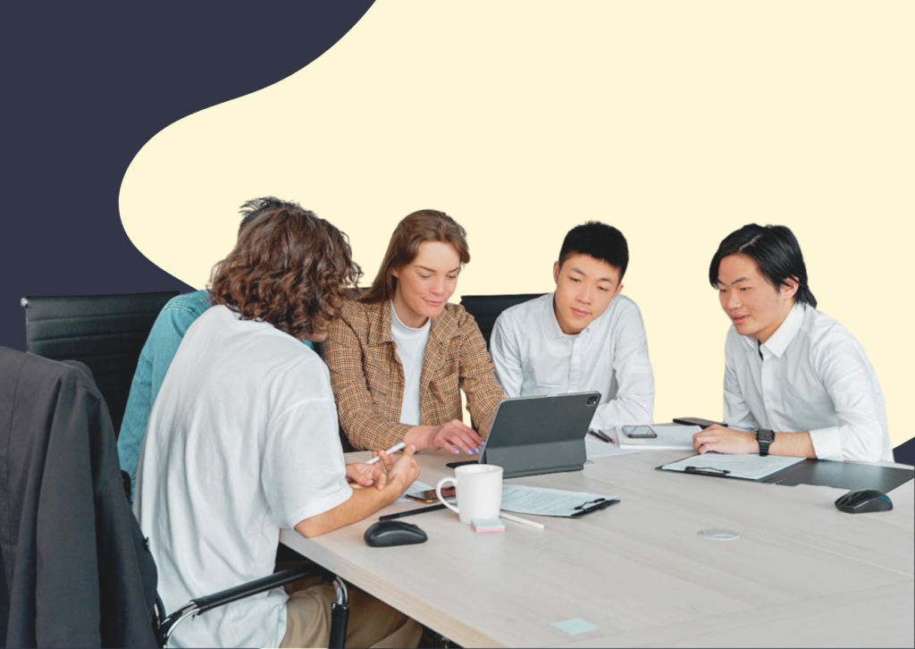 Accounting team reviewing client onboarding together at a desk